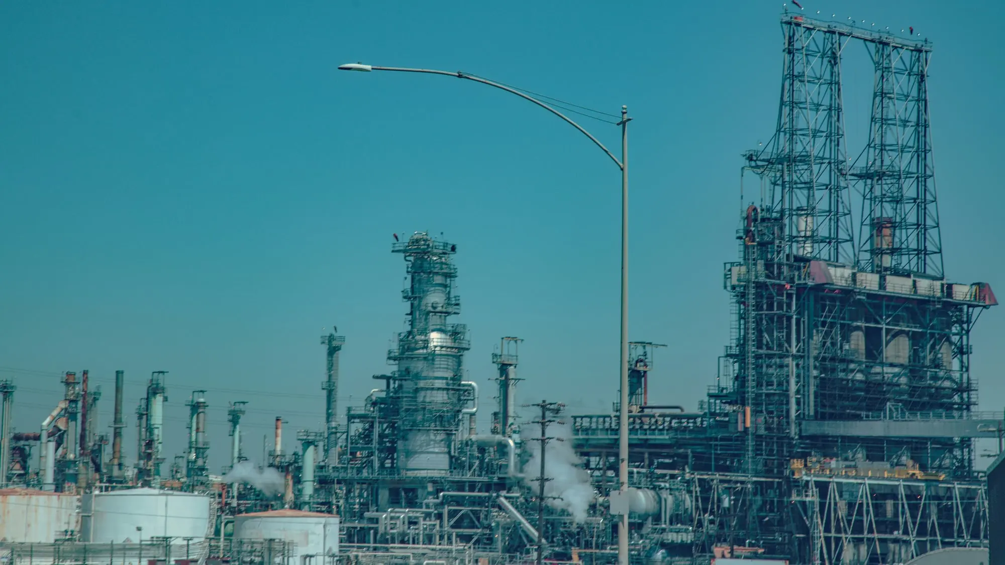 A refinery, with pipe racks and distillation columns